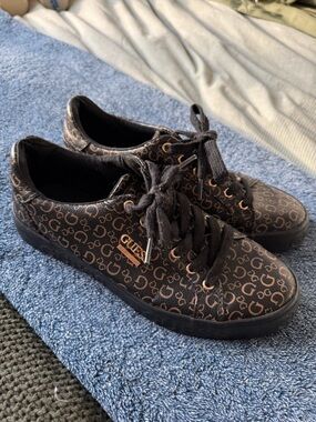 Guess brown monogram lace-up sneakers with gold logo accents
